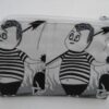 Handmade zipper coin purse made with Addams Family fabric