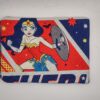Handmade small zipper bag made with Wonder Woman fabric