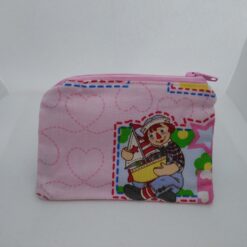 Handmade zipper coin purse made with Raggedy Ann fabric