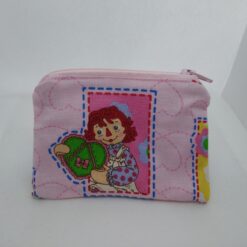 Handmade zipper coin purse made with Raggedy Ann fabric