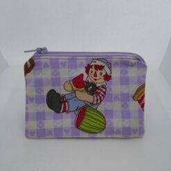 Handmade zipper coin purse made with Raggedy Ann fabric
