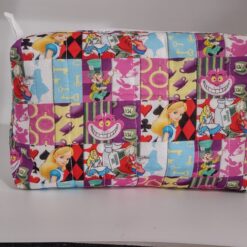 Handmade boxy zipper bag made with Alice in Wonderland fabric