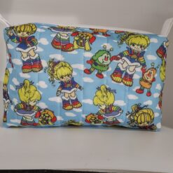 Handmade boxy zipper bag made with Rainbow Brite fabric