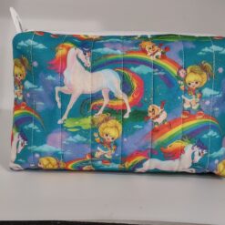 Handmade boxy zipper bag made with Rainbow Brite fabric