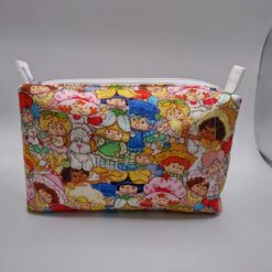 Handmade boxy zipper bag made with Strawberry Shortcake fabric