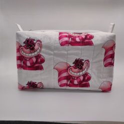 Handmade boxy zipper bag made with Alice in Wonderland fabric