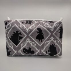 Handmade boxy zipper bag made with Alice in Wonderland fabric