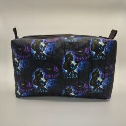 Handmade boxy zipper bag made with Alice in Wonderland fabric